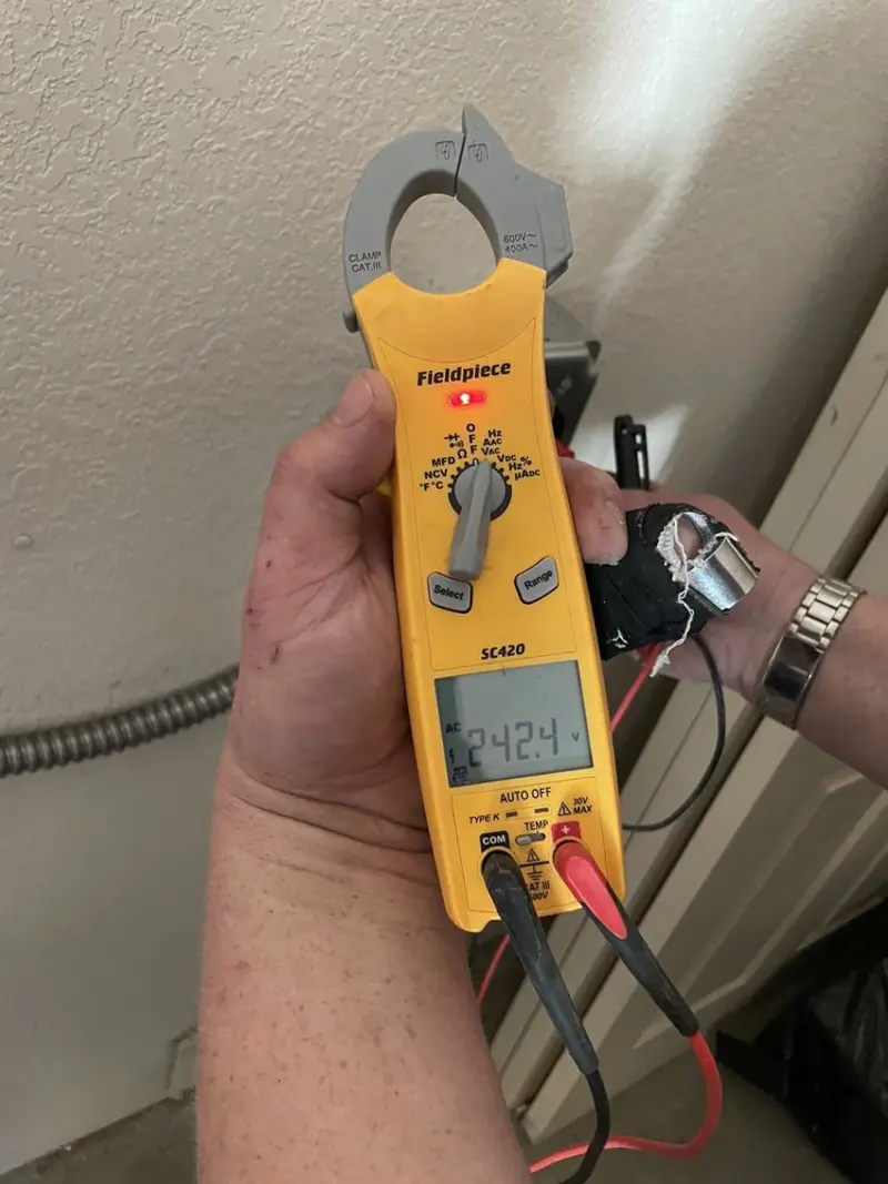 Voltage testing with clamp meter during Generator Installation in Goshen